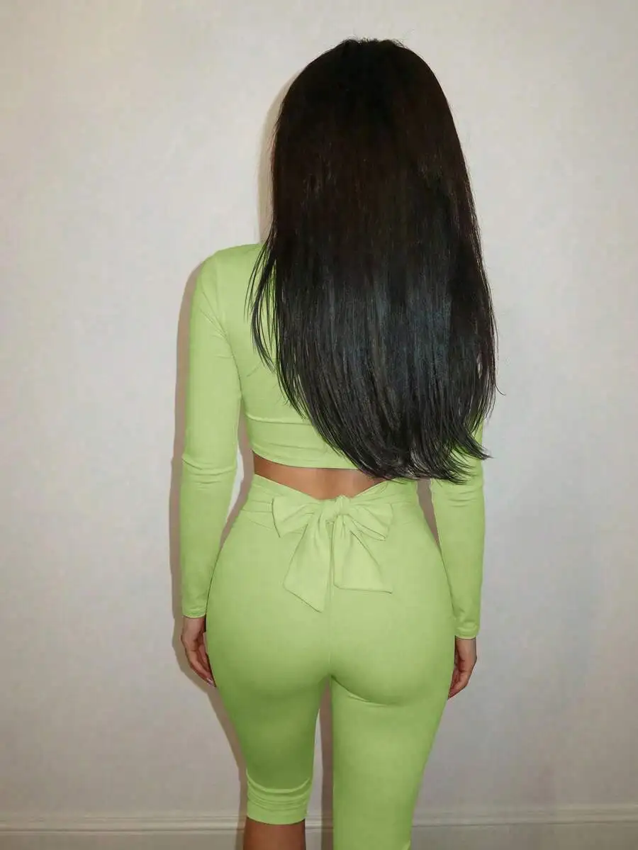 Lime Green Two Piece Set Crop Top And High Waist Pants With Bow Back Detail
Lime Green Two Piece Set Crop Top And High Waist Pants With Bow Back Detail