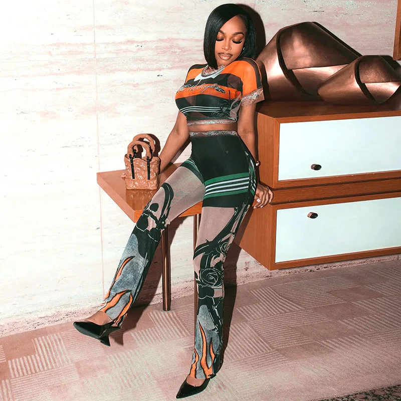 2025 Summer Mesh Printed Sheer Slim 2 Piece Set Women O Neck Short Sleeve Crop Top High Waist Skinny Pants Casual Street Outfits
2025 Summer Mesh Printed Sheer Slim 2 Piece Set Women O Neck Short Sleeve Crop Top High Waist Skinny Pants Casual Street Outfits