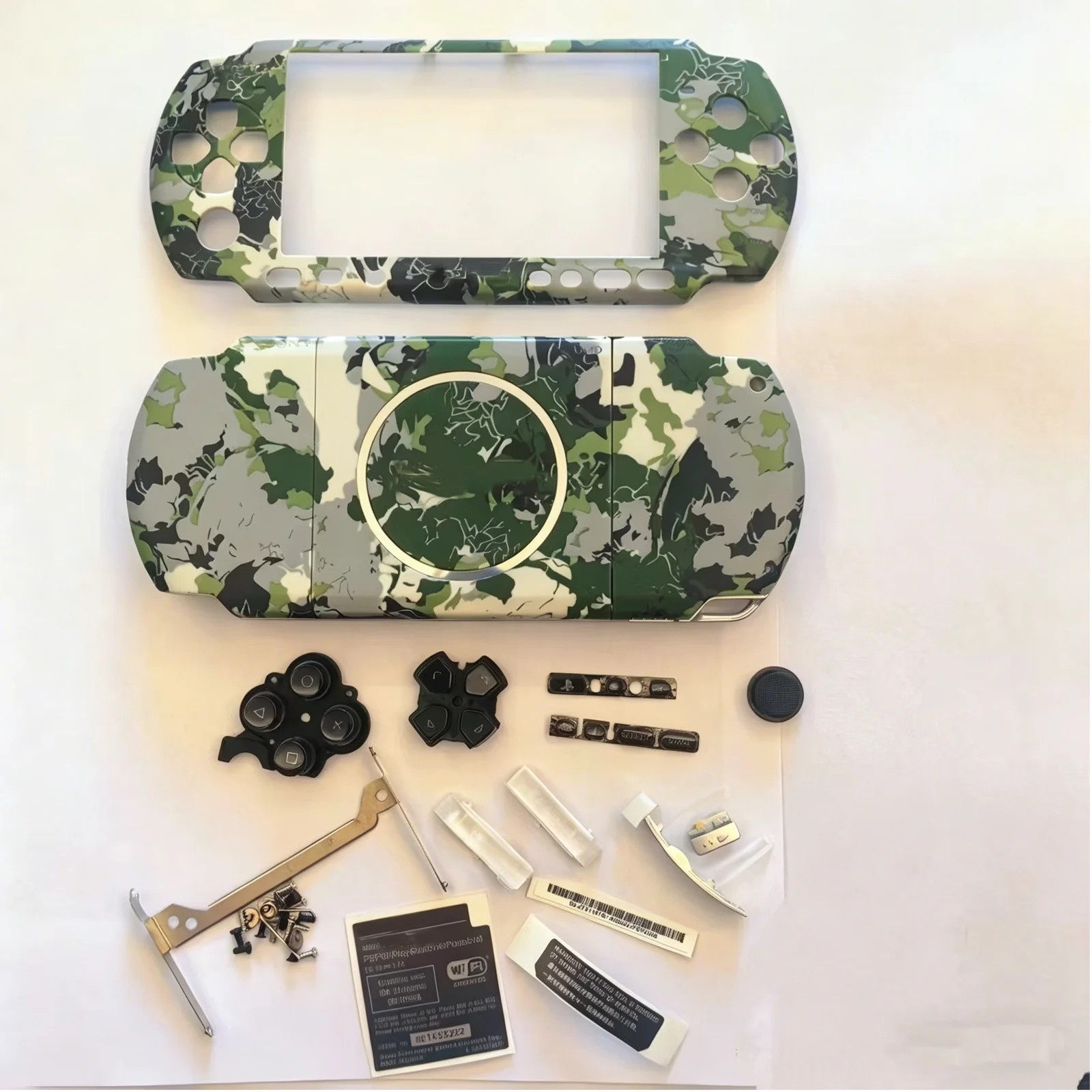 Камуфляжный полный корпус-чехол для консоли PSP3000, полный комплект с кнопками и комплектом для ремонта.
Камуфляжный полный корпус-чехол для консоли PSP3000, полный комплект с кнопками и комплектом для ремонта.