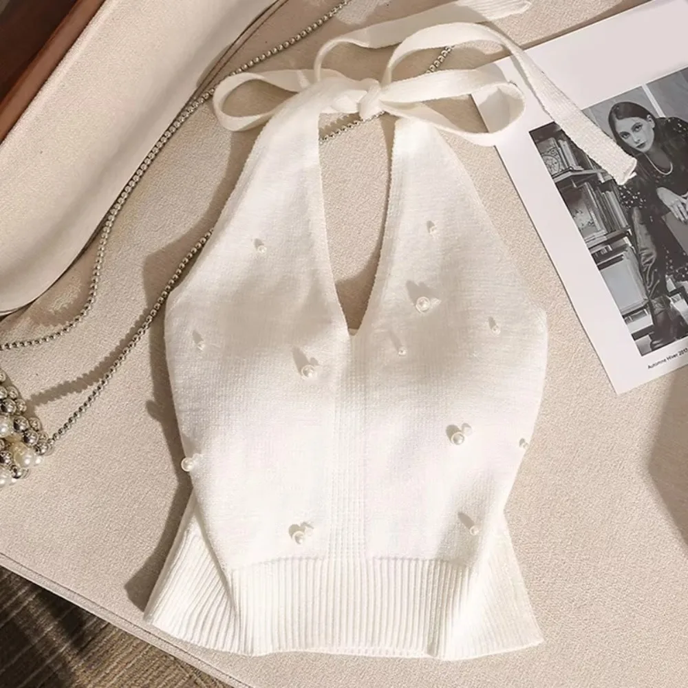 Backless Design French Beaded Vest Tie Knot Detail Knitted Fabric Halter Neck Vest Beaded Embellishment Halter Style
Backless Design French Beaded Vest Tie Knot Detail Knitted Fabric Halter Neck Vest Beaded Embellishment Halter Style