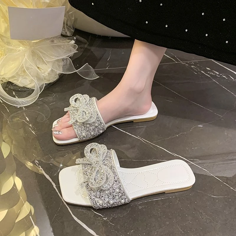New Summer Women's Elegant Rhinestone Flat Sandals with Bow Fairy Style Light Luxury Outdoor Fashionable Trendy for Skirts
New Summer Women's Elegant Rhinestone Flat Sandals with Bow Fairy Style Light Luxury Outdoor Fashionable Trendy for Skirts
