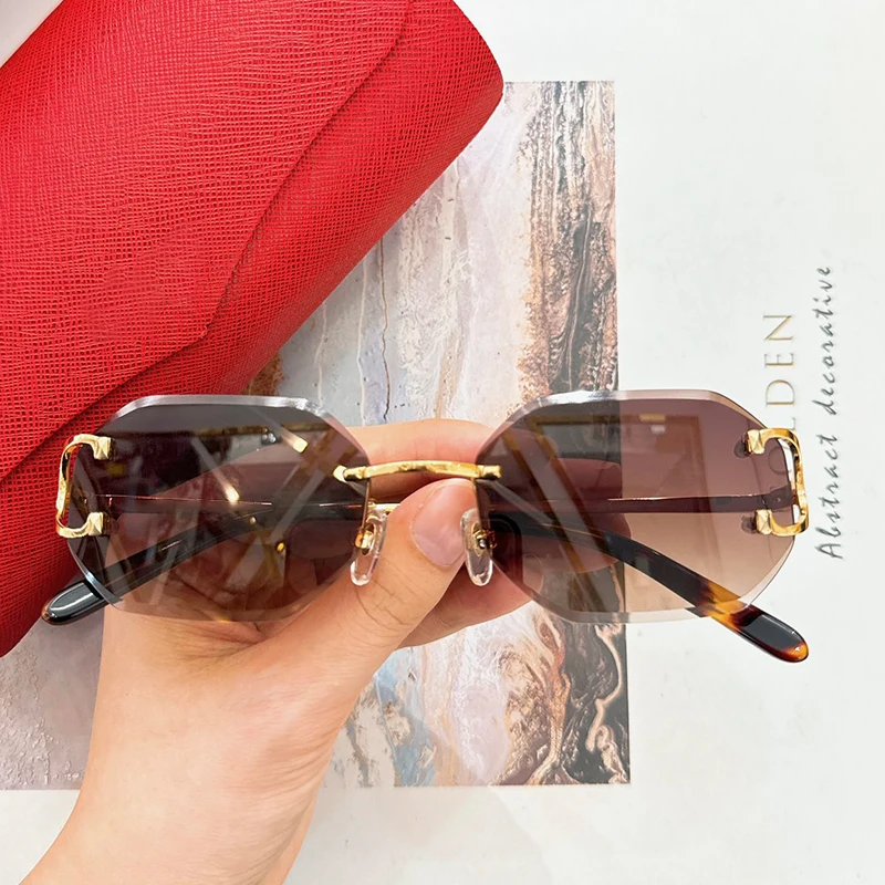 0019O Polygon Rimless Fashion Alloy Sunglasses Gradient Uv400 Designer France Style Men Ladies Eyeglasses with Case
0019O Polygon Rimless Fashion Alloy Sunglasses Gradient Uv400 Designer France Style Men Ladies Eyeglasses with Case