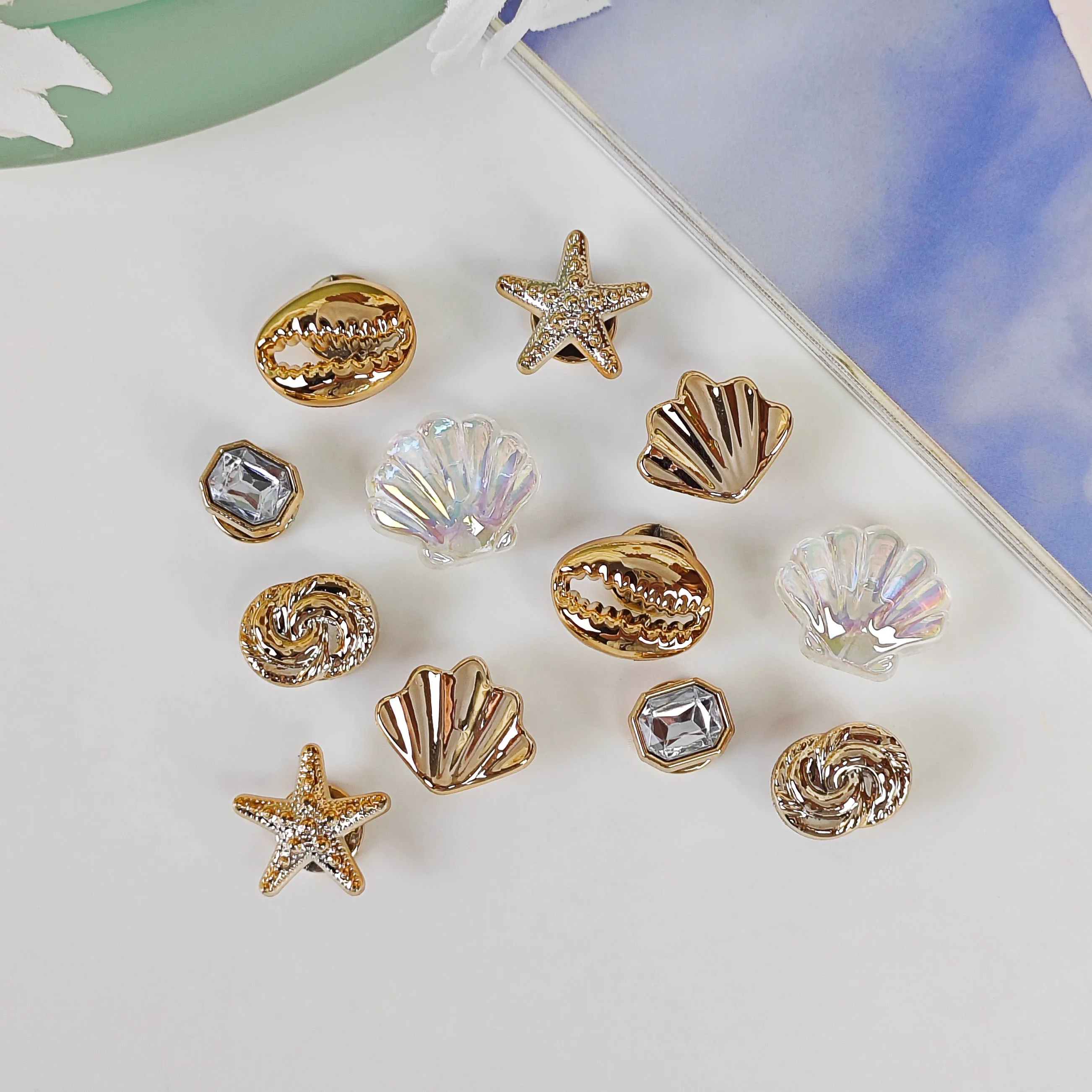 12Pcs DIY Shoe Decoration Charms Shiny Shells, Conch Shells, Star Decorative Buckles Non-Metallic Lightweight Material Y2K Fashion Versatile Cute and Unique for Both Men and Women Suitable for Eva Beach Shoes, Sandals, Removable Shoe Decoration, Holiday G
12Pcs DIY Shoe Decoration Charms Shiny Shells, Conch Shells, Star Decorative Buckles Non-Metallic Lightweight Material Y2K Fashion Versatile Cute and Unique for Both Men and Women Suitable for Eva Beach Shoes, Sandals, Removable Shoe Decoration, Holiday G