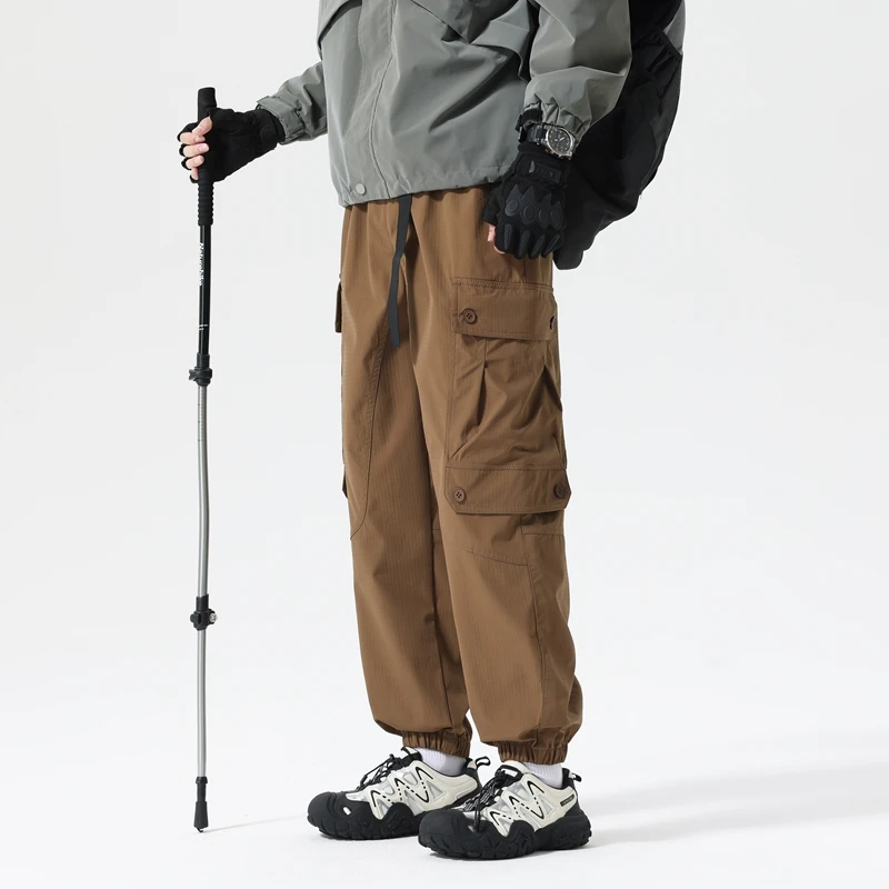 Новые мужские водонепроницаемые походные брюки, дышащие необрастающие свободные брюки-карго с эластичным поясом, повседневные спортивные брюки для кемпинга
Новые мужские водонепроницаемые походные брюки, дышащие необрастающие свободные брюки-карго с эластичным поясом, повседневные спортивные брюки для кемпинга