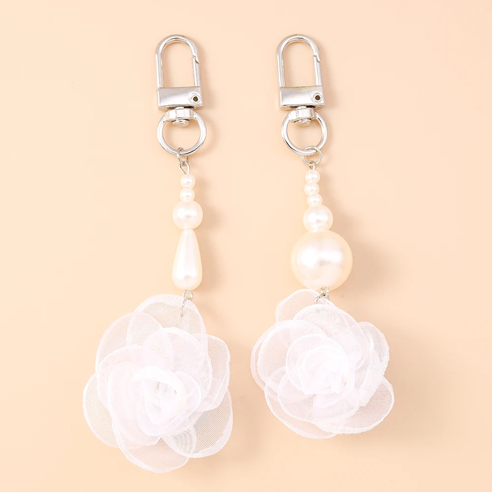 Pretty Handmade Flower Keychain Women Girls Pearl Key Ring Pendants for Handbag Decor DIY Key Chain Gifts 
Pretty Handmade Flower Keychain Women Girls Pearl Key Ring Pendants for Handbag Decor DIY Key Chain Gifts