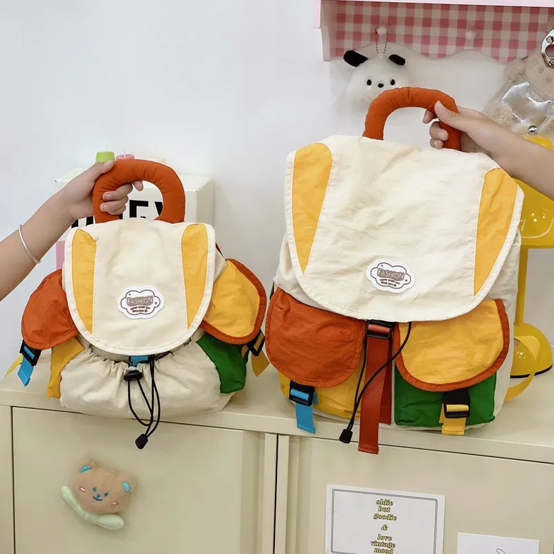 Parent-child backpack, outdoor hiking bag, color-block travel backpack
Parent-child backpack, outdoor hiking bag, color-block travel backpack