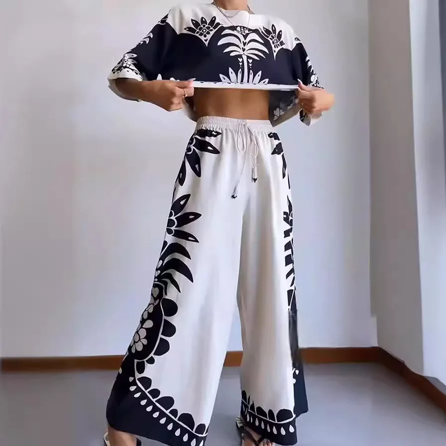 Casual Print 2 Piece Set Women Fashion Round Neck Half Sleeve Short Style Pullover Top Elastic Waist Lace Up Wide Leg Pants Suit
Casual Print 2 Piece Set Women Fashion Round Neck Half Sleeve Short Style Pullover Top Elastic Waist Lace Up Wide Leg Pants Suit