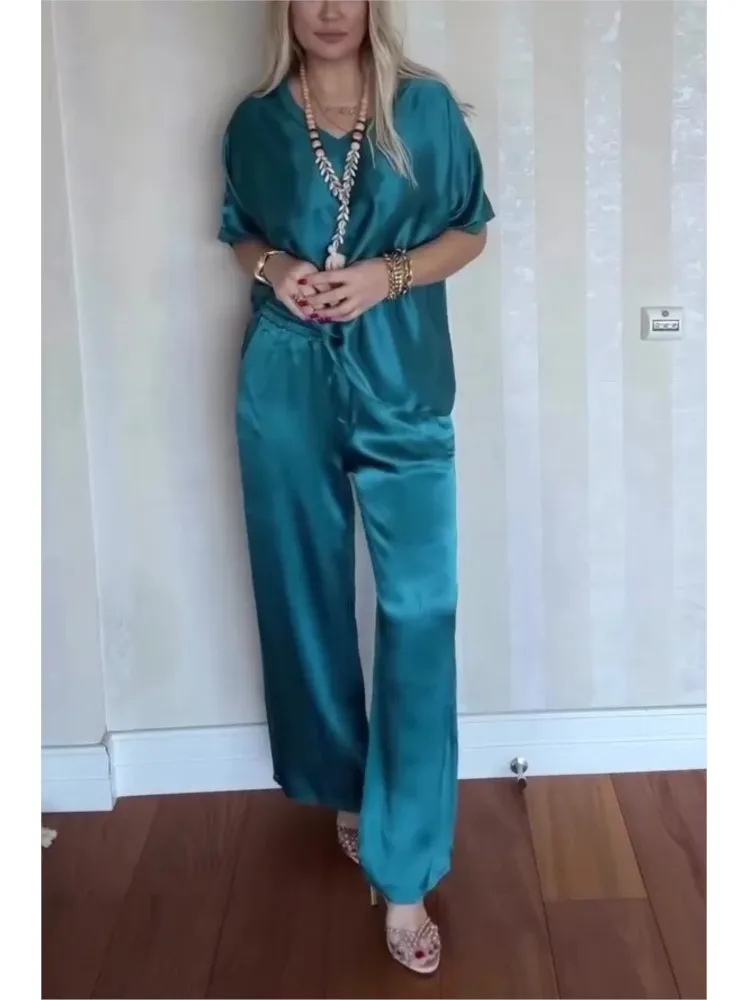 2025 Summer Casual Solid Color Satin Two Piece Sets Women V-neck Tops Long Pants Loose Suits Female Fashion Ladies Pocket Sets
2025 Summer Casual Solid Color Satin Two Piece Sets Women V-neck Tops Long Pants Loose Suits Female Fashion Ladies Pocket Sets
