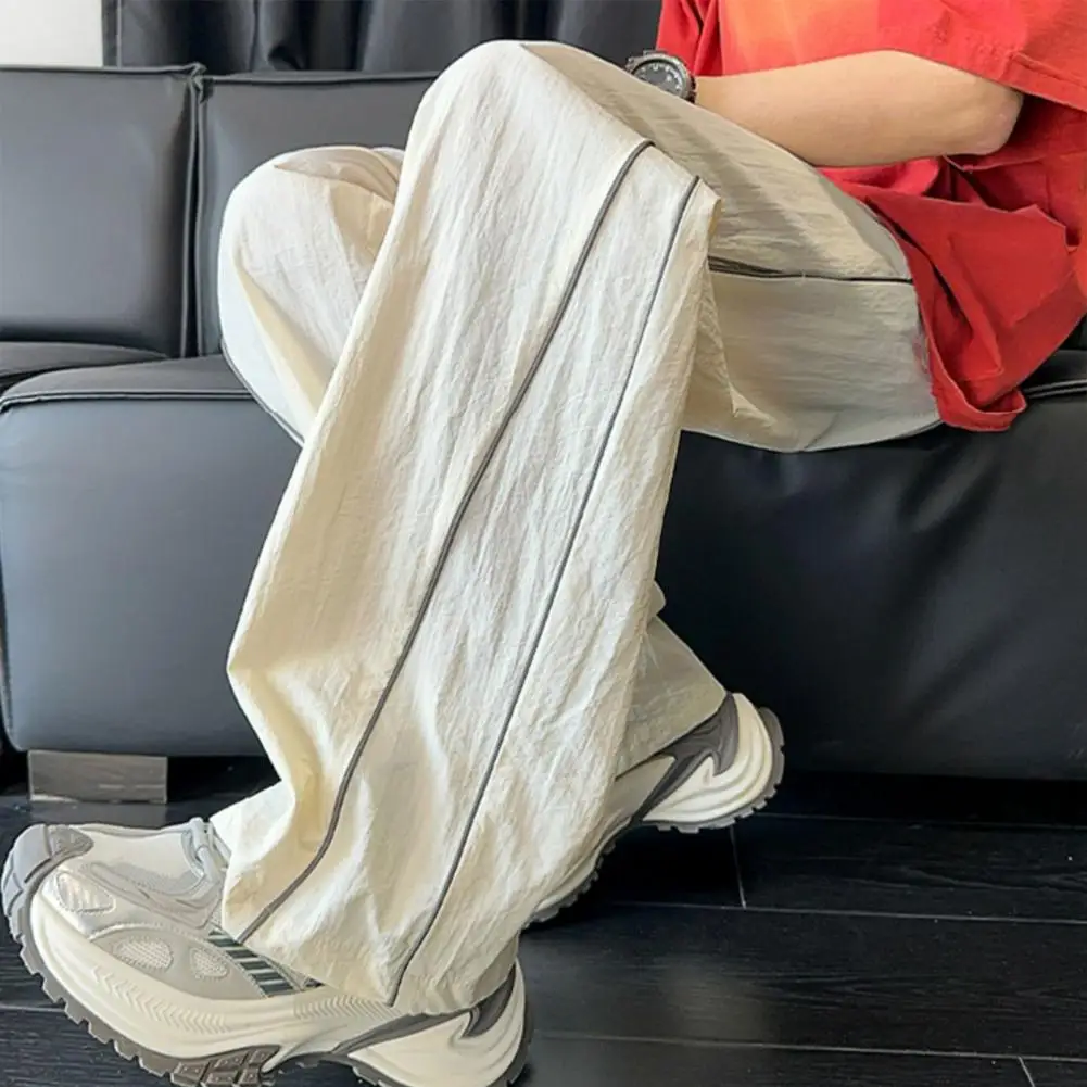Men Polyester Pants Stylish Men's Quick-dry Baggy Trousers with Drawstring Waist Side Lines Decoration for Street Vacation Wear
Men Polyester Pants Stylish Men's Quick-dry Baggy Trousers with Drawstring Waist Side Lines Decoration for Street Vacation Wear