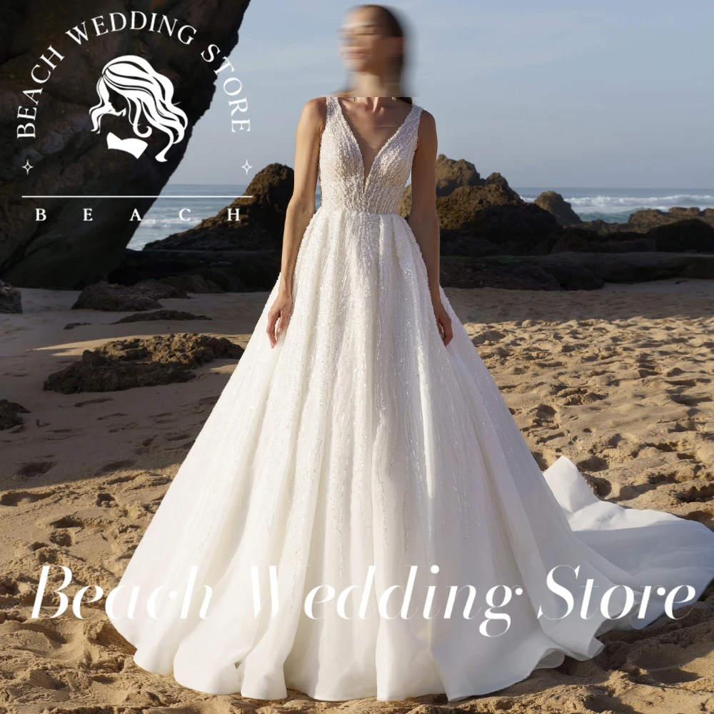 Beach Customized 2025 Floor Length Elegant Backless Prom Wedding Dresses for Women Simple Sleeveless V-Neck Tulle Bridal Gowns
Beach Customized 2025 Floor Length Elegant Backless Prom Wedding Dresses for Women Simple Sleeveless V-Neck Tulle Bridal Gowns