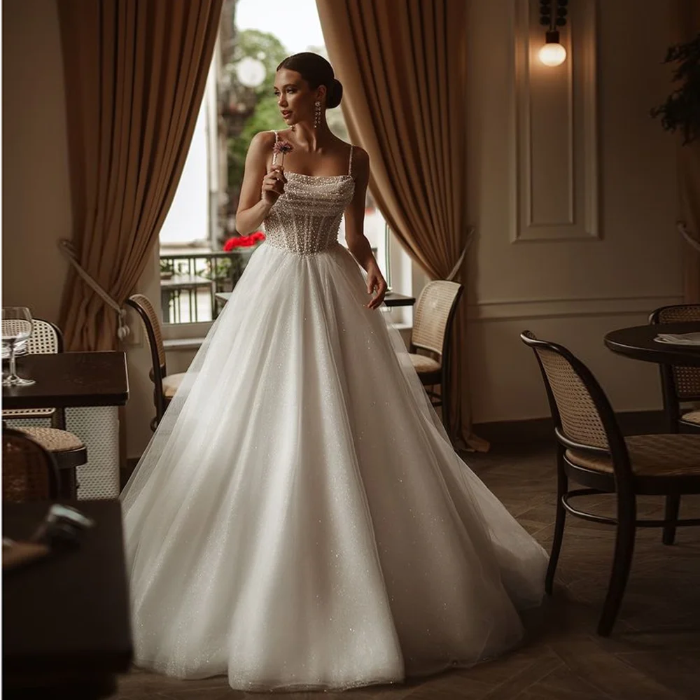 Customized Spaghetti Straps Tulle Shiny Wedding Dress A-line Beaded Backless Lace up Wedding Gown Lace up Court Wedding Gown
Customized Spaghetti Straps Tulle Shiny Wedding Dress A-line Beaded Backless Lace up Wedding Gown Lace up Court Wedding Gown