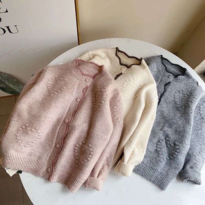Autumn and winter new children's sweater Korean version of girls' knitted cardigan love jacquard warm jacket
Autumn and winter new children's sweater Korean version of girls' knitted cardigan love jacquard warm jacket