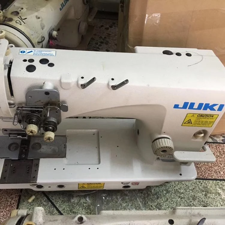 Used Industrial with 2-needle Lockstitch Sewing Machine
Used Industrial with 2-needle Lockstitch Sewing Machine