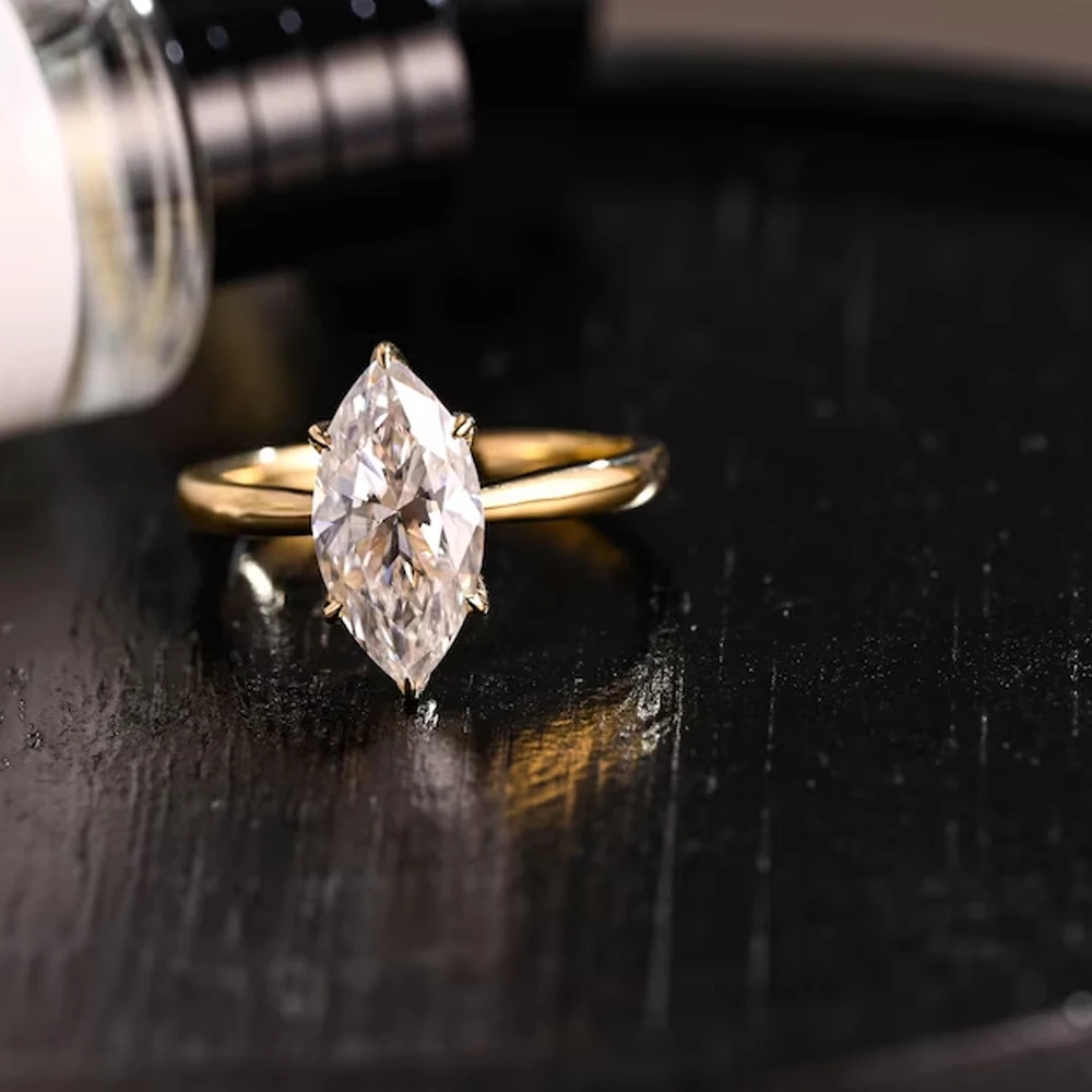 1.5ct FG Solitaire S925 Gold Plated Marquise Cut Moissanite Engagement Ring Cathedral Wedding Anniversary Ring Gift for Wome
1.5ct FG Solitaire S925 Gold Plated Marquise Cut Moissanite Engagement Ring Cathedral Wedding Anniversary Ring Gift for Wome