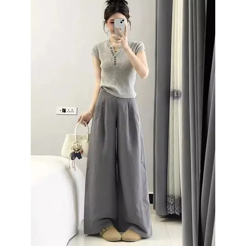 Fashion Slimming Short Sleeved Wide Leg Pants Two-piece Set for Summer 2026 New American Retro and Western-style Suit for Women
Fashion Slimming Short Sleeved Wide Leg Pants Two-piece Set for Summer 2026 New American Retro and Western-style Suit for Women