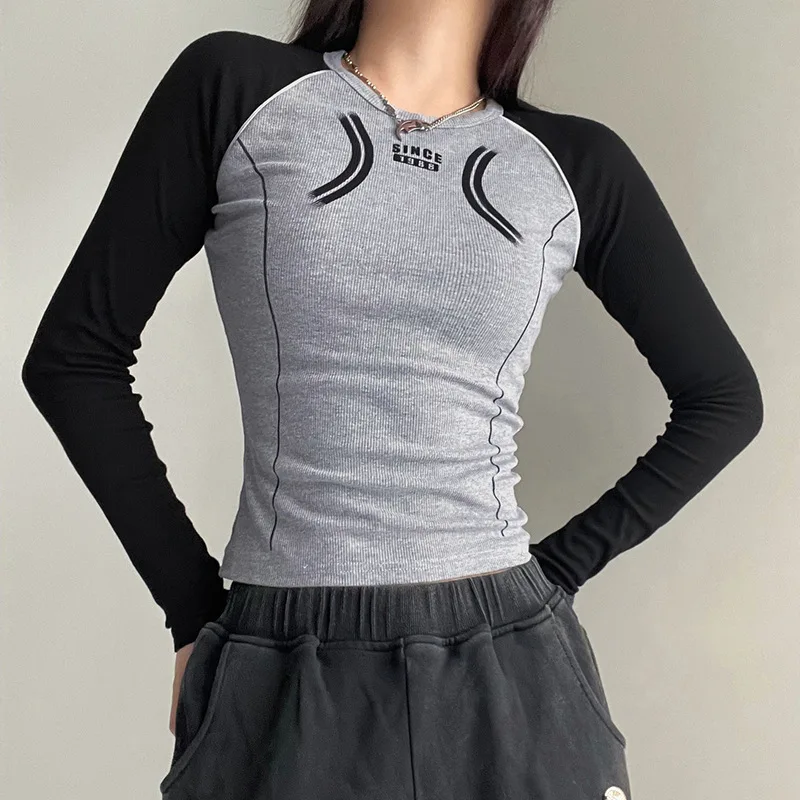 Europe and the United States new tight-fitting navel Joker girl color matching round neck high street casual T-shirt women
Europe and the United States new tight-fitting navel Joker girl color matching round neck high street casual T-shirt women