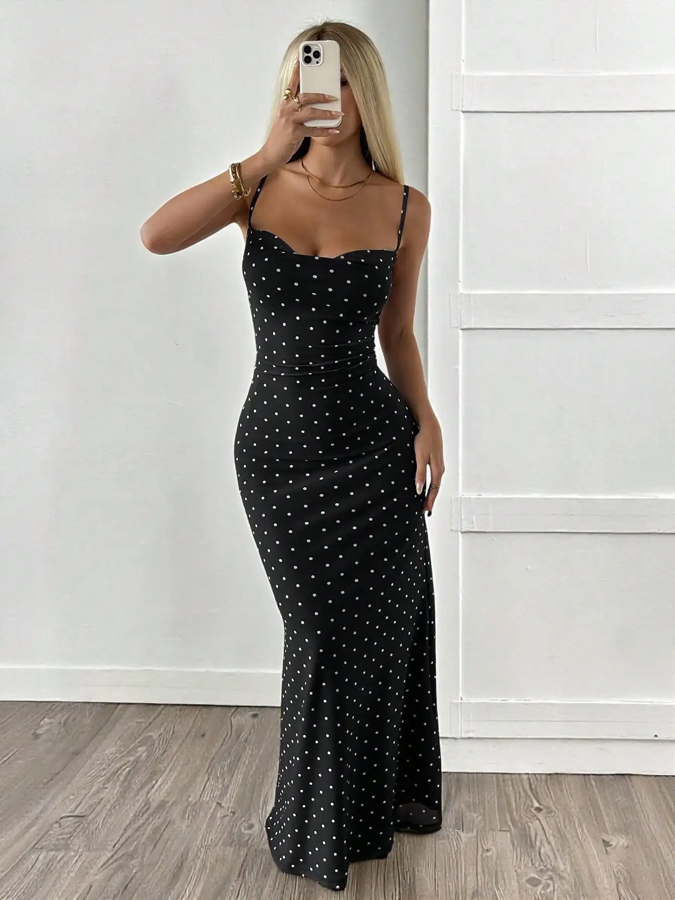 Black Polka Dot Sleeveless Maxi Dress with Ruched Bodice and Bodycon Fit
Black Polka Dot Sleeveless Maxi Dress with Ruched Bodice and Bodycon Fit