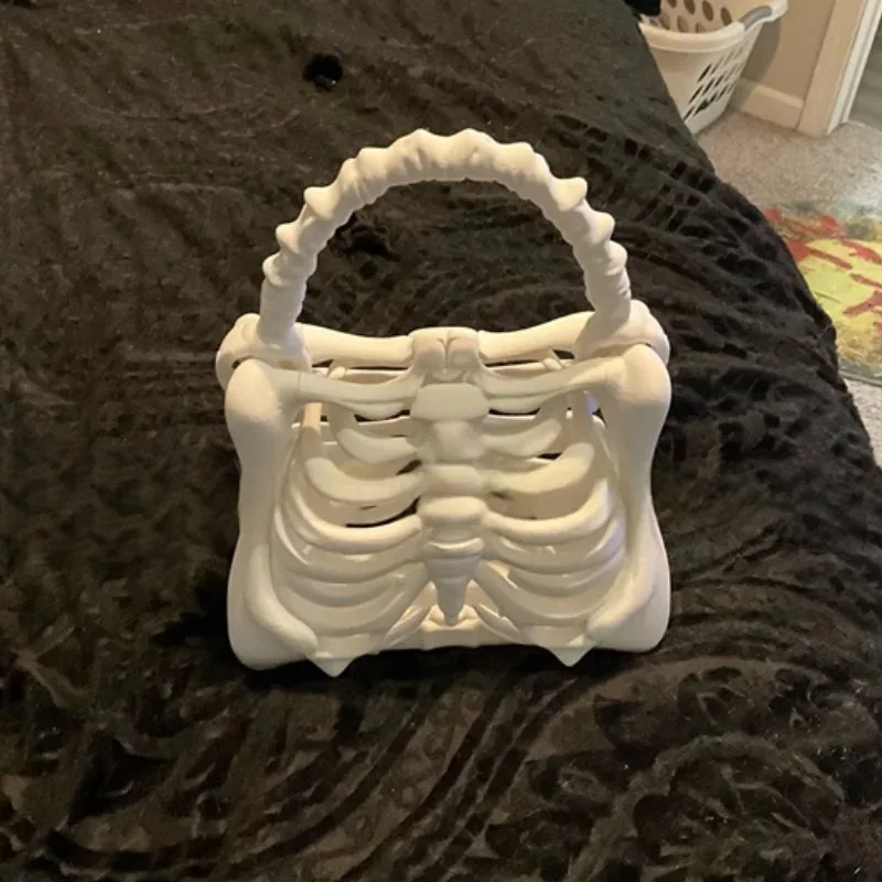Creative and Fun Skull Hand-held Gothic Ribbed Cage Shaped Unique Halloween Party Women's Handbag Gift, Costume Party Handbag
Creative and Fun Skull Hand-held Gothic Ribbed Cage Shaped Unique Halloween Party Women's Handbag Gift, Costume Party Handbag