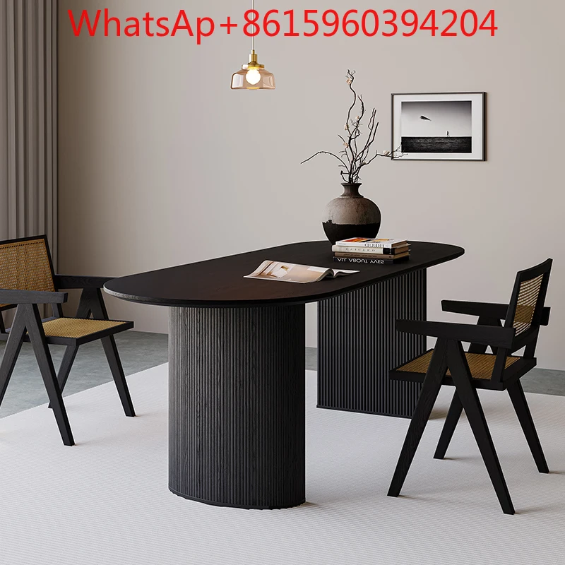 Custom black solid wood dining table oval arc Long dining table and chair combination modern simple
Custom black solid wood dining table oval arc Long dining table and chair combination modern simple
