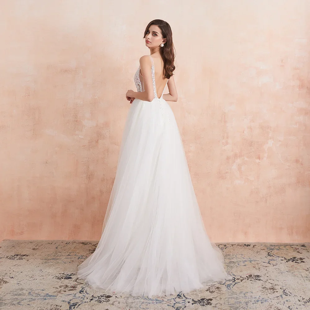 MYYBLE V Neck Wedding Dress White Ivory Sexy High Splits Pearls Crystal A-Line Formal Gown
MYYBLE V Neck Wedding Dress White Ivory Sexy High Splits Pearls Crystal A-Line Formal Gown
