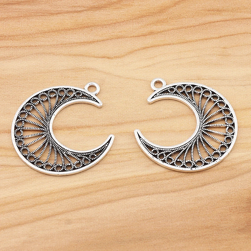30 Pieces Tibetan Silver Double Sided Open Filigree Crescent Moon Charms Pendant Beaded For DIY Bracelet Necklace Jewelry Making
30 Pieces Tibetan Silver Double Sided Open Filigree Crescent Moon Charms Pendant Beaded For DIY Bracelet Necklace Jewelry Making