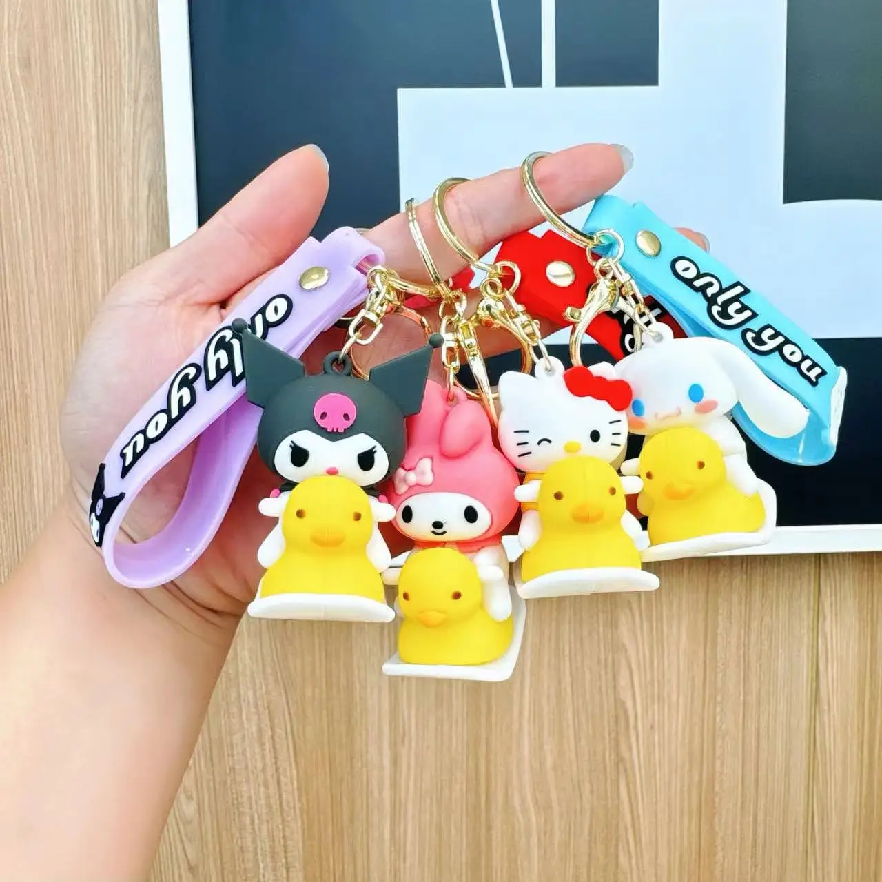 Sanrio Duck Ride Keychain Set Kuromi MyMelody Cute Cartoon 3D Character Keychains With Colorful Wrist Strap Kawaii Bag Accessory
Sanrio Duck Ride Keychain Set Kuromi MyMelody Cute Cartoon 3D Character Keychains With Colorful Wrist Strap Kawaii Bag Accessory