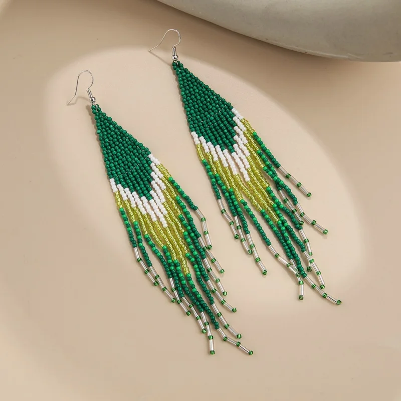 Rice bead earrings Tassel Colour Originality Design Hand knitting Bohemia Alloy Fashion Simple Beaded earrings
Rice bead earrings Tassel Colour Originality Design Hand knitting Bohemia Alloy Fashion Simple Beaded earrings