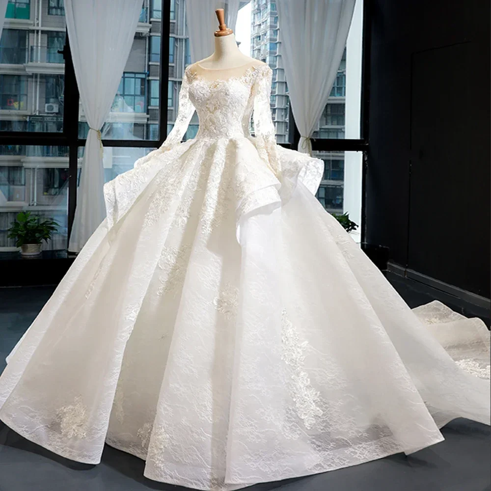 Fashion O-Neck Long Sleeves Appliques Wedding Dresses Exquisite Beads Lace Chapel Train Ball Gowns Elegant White Bride Dresses
Fashion O-Neck Long Sleeves Appliques Wedding Dresses Exquisite Beads Lace Chapel Train Ball Gowns Elegant White Bride Dresses