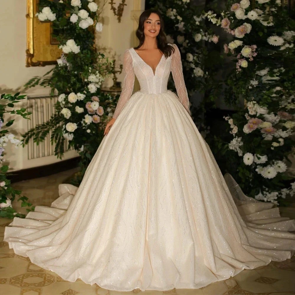 Роскошное бальное платье с v-образным вырезом, кружевные свадебные платья длиной до пола, с длинными рукавами, расшитые бисером свадебные платья, Vestido de novia, по индивидуальному заказу
Роскошное бальное платье с v-образным вырезом, кружевные свадебные платья длиной до пола, с длинными рукавами, расшитые бисером свадебные платья, Vestido de novia, по индивидуальному заказу