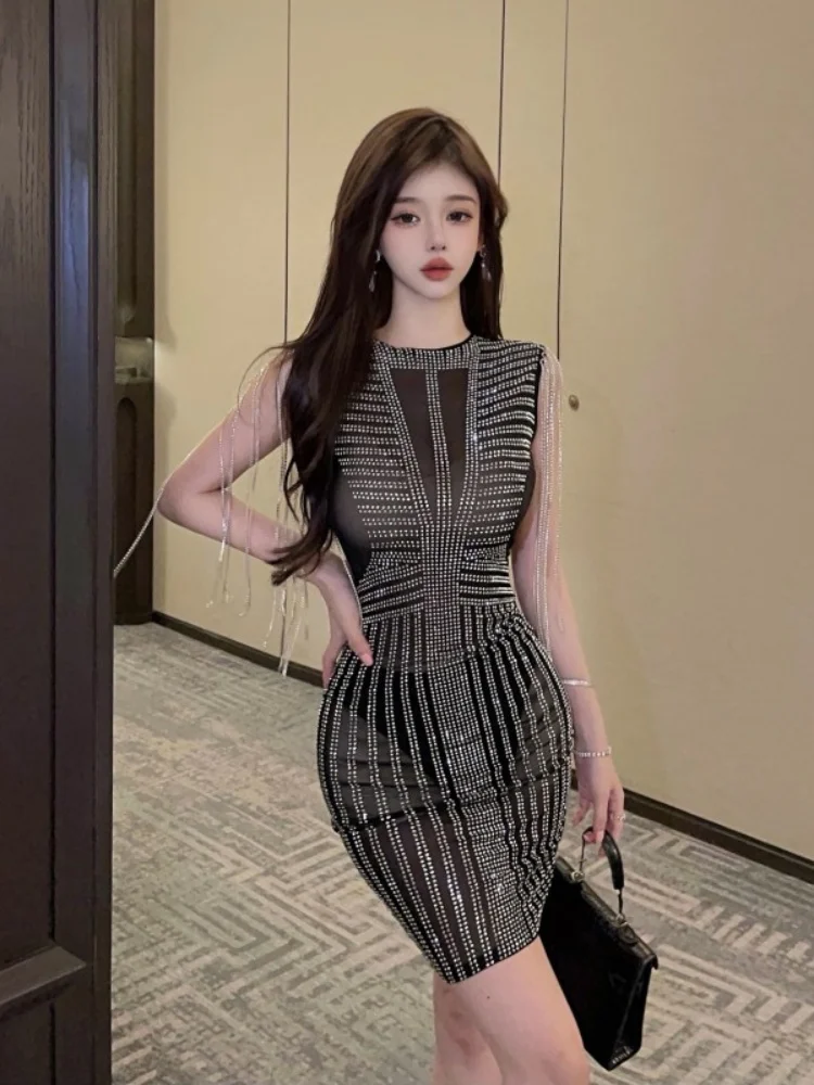 New Fashion Sexy Mesh Rhinestone Sleeveless Tassel Dress Women's Runway Party Dress Vestidos
New Fashion Sexy Mesh Rhinestone Sleeveless Tassel Dress Women's Runway Party Dress Vestidos