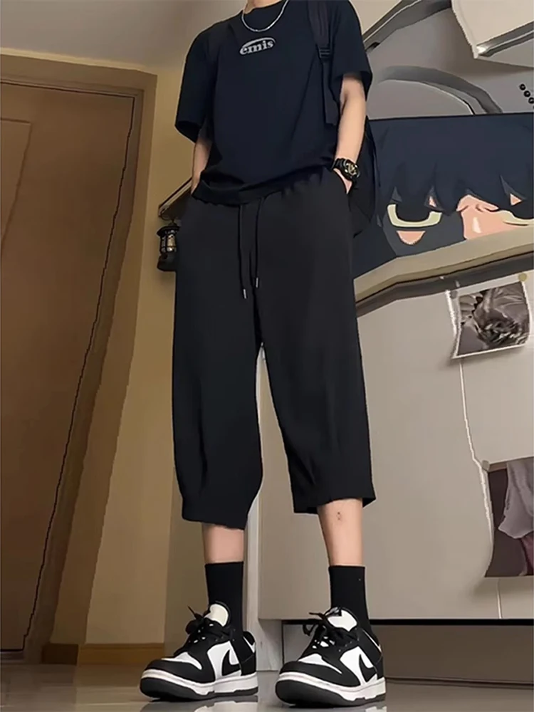 Мужские летние тонкие брюки из ледяного шелка Pure Bla, быстросохнущие, свободного кроя, выше колена, молодежные, повседневные
Мужские летние тонкие брюки из ледяного шелка Pure Bla, быстросохнущие, свободного кроя, выше колена, молодежные, повседневные