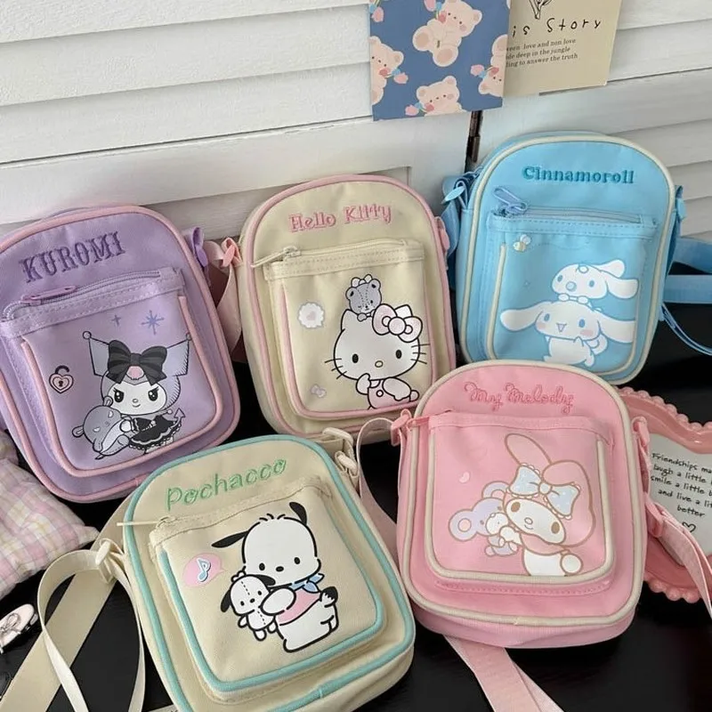 New Sweet Cute Hello Kitty Mini Canvas Crossbody Bag Melody Kuromi Shoulder Bag Cute Sanrio Handbag Children Coin Wallet Gift
New Sweet Cute Hello Kitty Mini Canvas Crossbody Bag Melody Kuromi Shoulder Bag Cute Sanrio Handbag Children Coin Wallet Gift