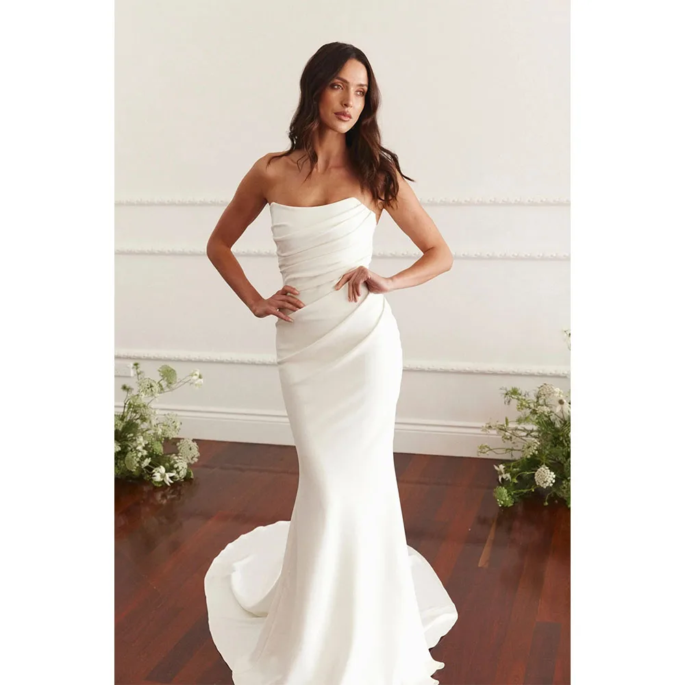 White Strapless Mermaid Long Train Wedding Dress 2025 Simple Pleated Sleeveless Bridal Gown vestidos de novia Button Customized
White Strapless Mermaid Long Train Wedding Dress 2025 Simple Pleated Sleeveless Bridal Gown vestidos de novia Button Customized