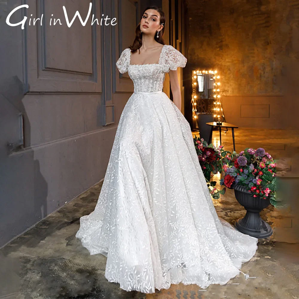 Очаровательные кружевные свадебные платья трапециевидной формы с короткими рукавами и квадратным воротником, со шлейфом и открытой спиной по индивидуальному заказу для женщин Rode De Morrie
Очаровательные кружевные свадебные платья трапециевидной формы с короткими рукавами и квадратным воротником, со шлейфом и открытой спиной по индивидуальному заказу для женщин Rode De Morrie