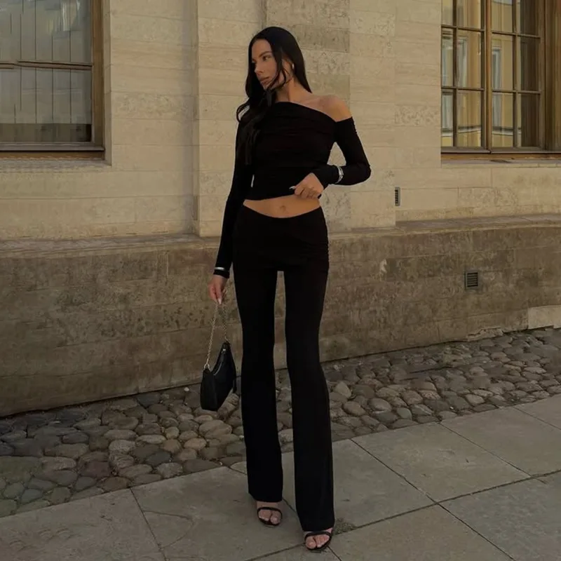 Однотонный комплект из 2 предметов, сексуальные футболки с наклонными плечами и длинными рукавами, рюшами, укороченные топы с запахом персикового цвета, расклешенные брюки, женский повседневный костюм
Однотонный комплект из 2 предметов, сексуальные футболки с наклонными плечами и длинными рукавами, рюшами, укороченные топы с запахом персикового цвета, расклешенные брюки, женский повседневный костюм