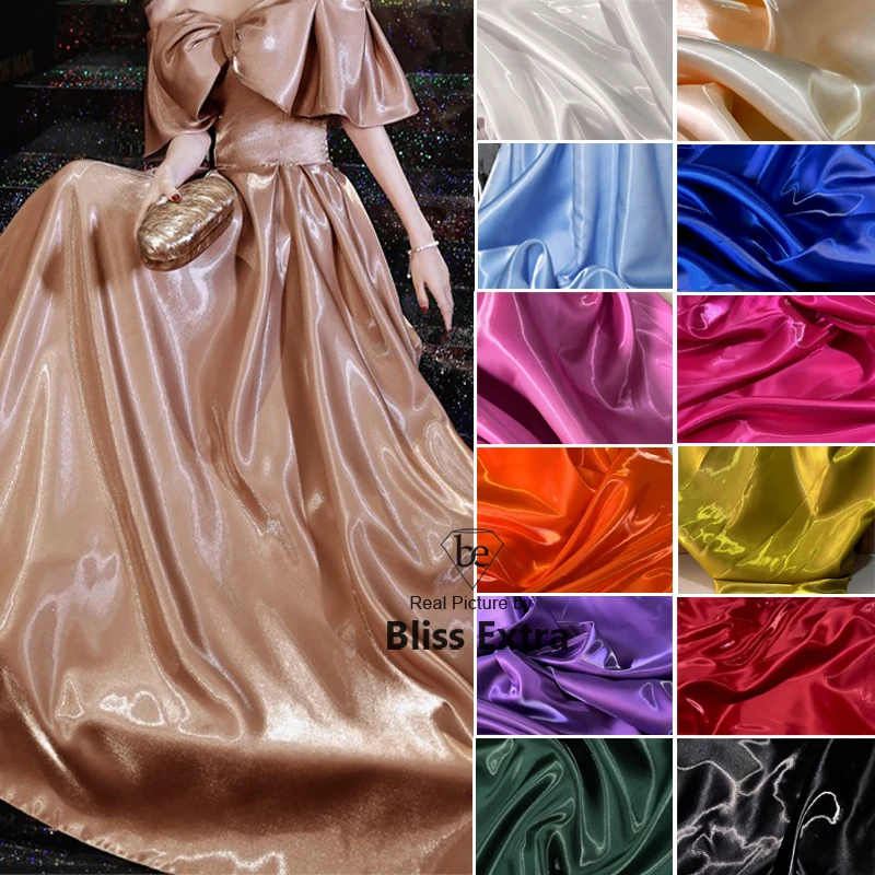Luxury Glossy Liquid Satin Fabric Solid Color Crystal Silk Satin Wedding Gift Clothing Designer Fabrics Textile
Luxury Glossy Liquid Satin Fabric Solid Color Crystal Silk Satin Wedding Gift Clothing Designer Fabrics Textile