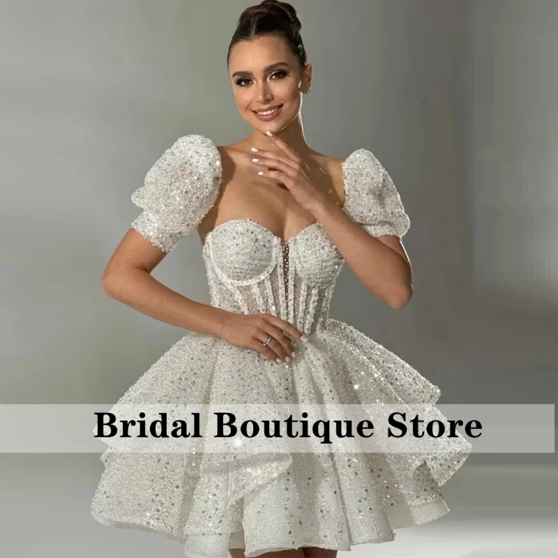 White Short Evening Dress Sweetheart A-Line Mini Wedding Dress 2026 Detachable Sleeves Prom Gowns Bride Formal Party Dress
White Short Evening Dress Sweetheart A-Line Mini Wedding Dress 2026 Detachable Sleeves Prom Gowns Bride Formal Party Dress