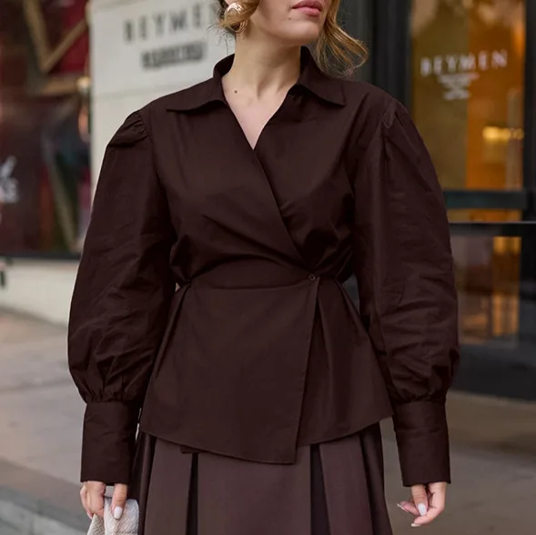 Autumn and Winter Design Sense Shirt Women's Lapel Bubble Sleeves Loose Waist Slimming Temperament Long Sleeves
Autumn and Winter Design Sense Shirt Women's Lapel Bubble Sleeves Loose Waist Slimming Temperament Long Sleeves