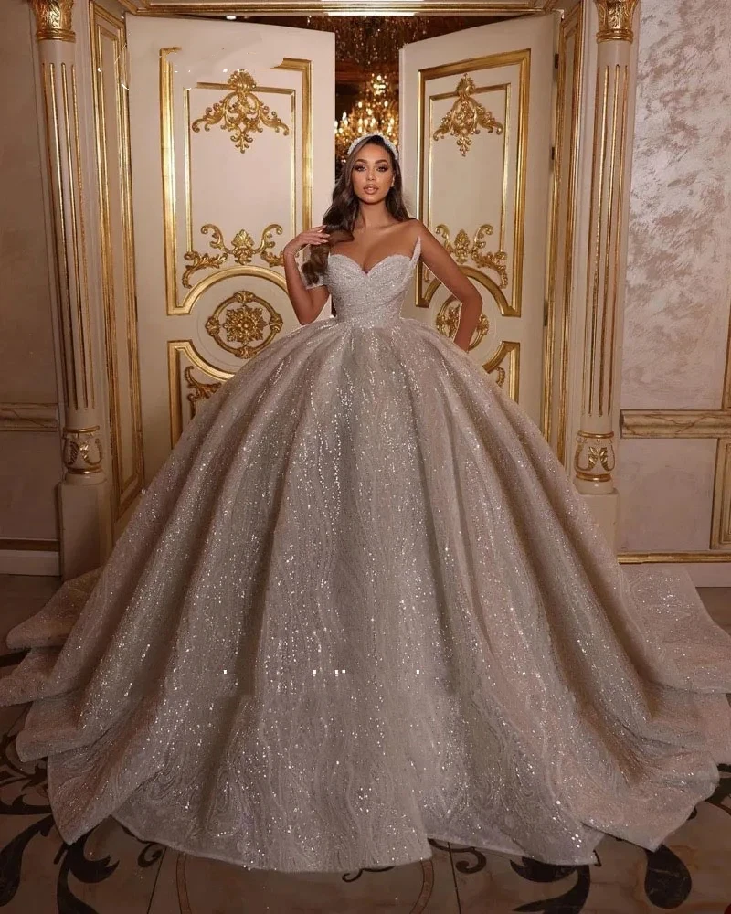 Luxurious Sparkling A-Line Glitter Women's Puffy Wedding Dress 2026 Sexy V-Neck Off Shoulder Auditorium Bridal Dress Customized
Luxurious Sparkling A-Line Glitter Women's Puffy Wedding Dress 2026 Sexy V-Neck Off Shoulder Auditorium Bridal Dress Customized