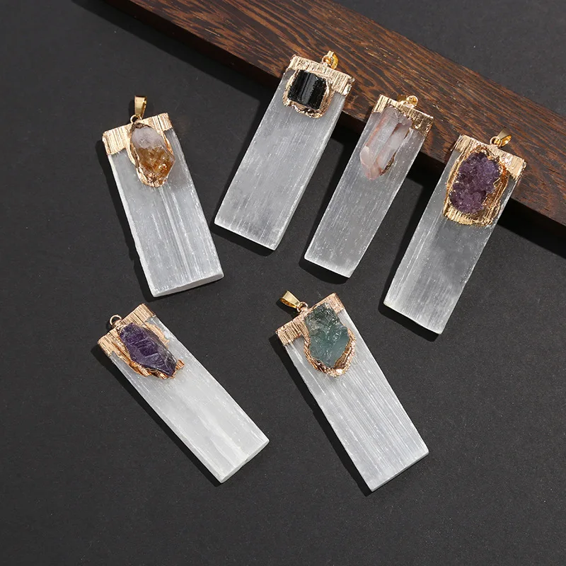 Natural Gypsum Strip Pendant, Long Strip Inlaid Crystal Column Pendant, Crystal Rough Stone Pendant, Sweater Chain.
Natural Gypsum Strip Pendant, Long Strip Inlaid Crystal Column Pendant, Crystal Rough Stone Pendant, Sweater Chain.