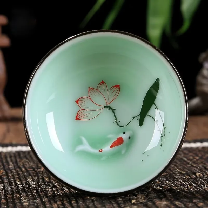 High Quality Celadon Chinese Kung Fu Tea Set Round Flat Lotus Carp Pu'er Tea Cups Hand-painted Ceramic Single Carp Teacup
High Quality Celadon Chinese Kung Fu Tea Set Round Flat Lotus Carp Pu'er Tea Cups Hand-painted Ceramic Single Carp Teacup