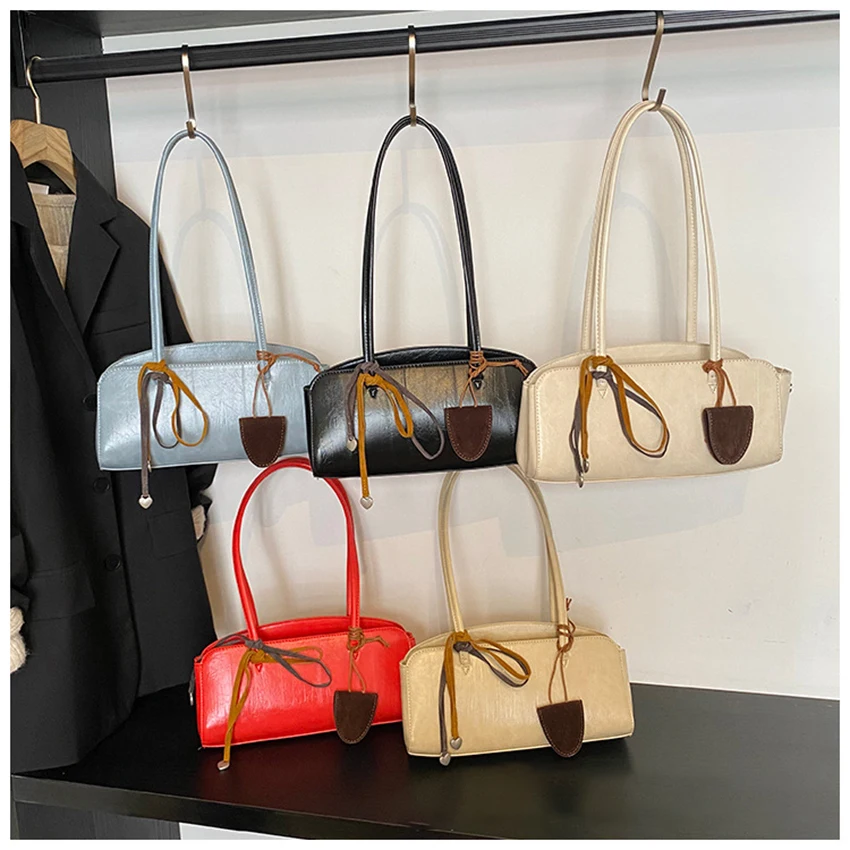 Корейская женская сумка подмышки, однотонная кожаная сумка с подвеской, модные простые универсальные женские дорожные сумки
Корейская женская сумка подмышки, однотонная кожаная сумка с подвеской, модные простые универсальные женские дорожные сумки