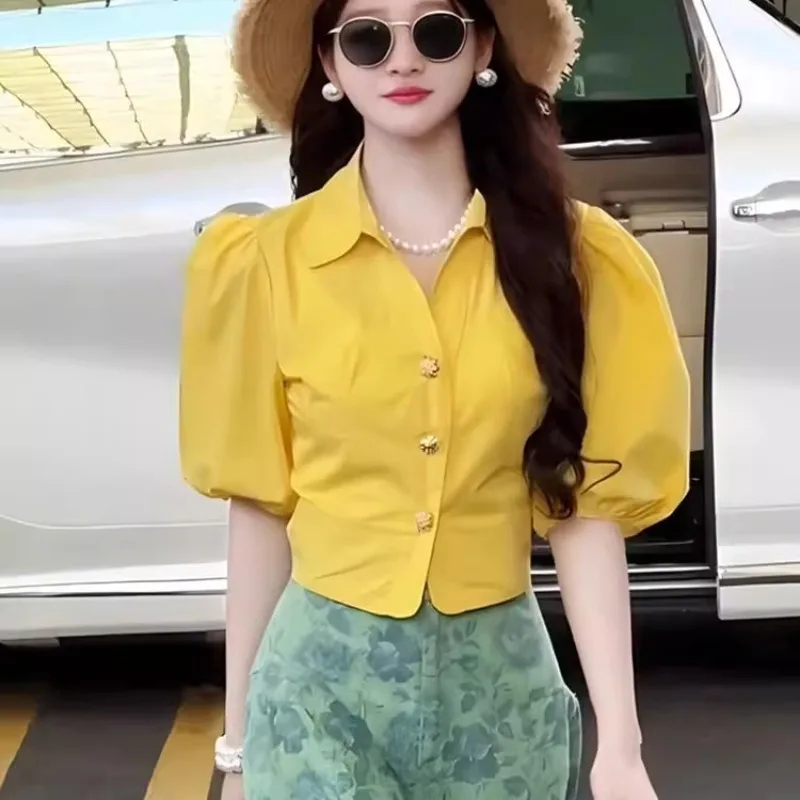 French Designer Elegant Blouse Sweet Elegant Women Luxury Puff Sleeve Single Breasted Yellow Shirts Polo Collar V-neck Summer
French Designer Elegant Blouse Sweet Elegant Women Luxury Puff Sleeve Single Breasted Yellow Shirts Polo Collar V-neck Summer