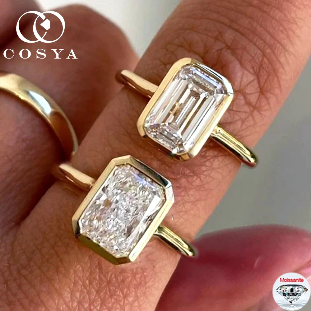 Кольцо COSYA с муассанитом (1/2/3/10 карат), изумрудной/радиантной огранки, для женщин, из серебра 925 пробы, минималистичное, для свадьбы, вечеринки, в подарок
Кольцо COSYA с муассанитом (1/2/3/10 карат), изумрудной/радиантной огранки, для женщин, из серебра 925 пробы, минималистичное, для свадьбы, вечеринки, в подарок