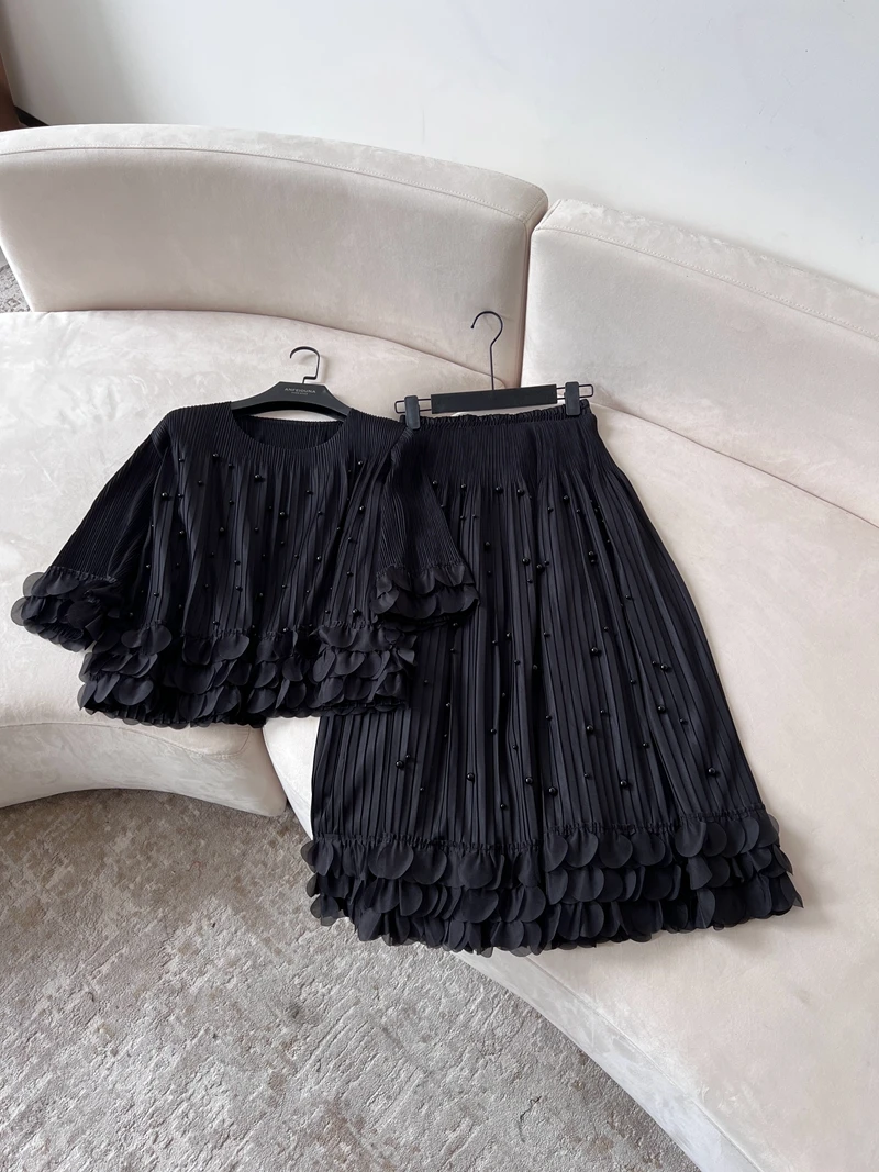 Bla AsymmetricFloral Embellied Плиссированный комплект миди с высокой талией Свободный комплект из топа и юбки Lantern Sve Обычная длина Au... 
Bla AsymmetricFloral Embellied Плиссированный комплект миди с высокой талией Свободный комплект из топа и юбки Lantern Sve Обычная длина Au...