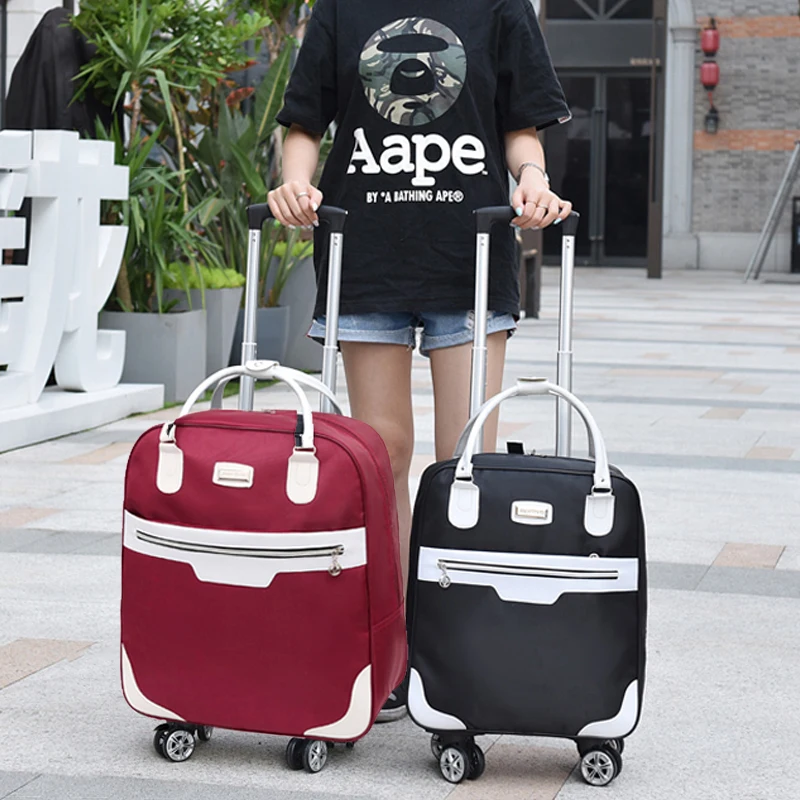 Large Capaci Ox Cloth Travel Bag Women's Handbag ort Trip Pull Rod Lage Bag Foldable Hand Drag Bag Faion Trend 
Large Capaci Ox Cloth Travel Bag Women's Handbag ort Trip Pull Rod Lage Bag Foldable Hand Drag Bag Faion Trend