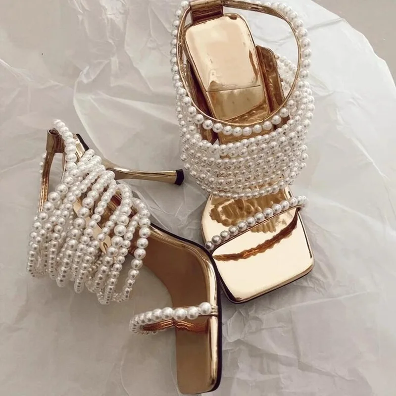 Square Toe High Heel Slippers Pearl Strap Open Toe Slip On Thin Heels Sandals Golden Beaded Hollow Strappy Mules Shoes 9CM
Square Toe High Heel Slippers Pearl Strap Open Toe Slip On Thin Heels Sandals Golden Beaded Hollow Strappy Mules Shoes 9CM