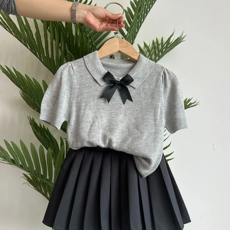 Girls' Short-Sleeve Summer2026New stylish children's bow-tie collar versatile top and pleated skirt set, lightweight style
Girls' Short-Sleeve Summer2026New stylish children's bow-tie collar versatile top and pleated skirt set, lightweight style