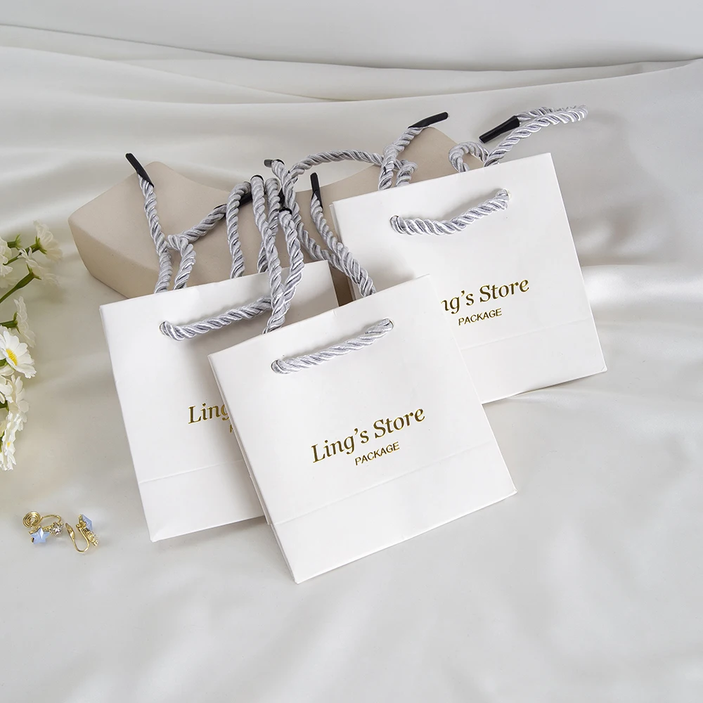 20/50/100Pcs Customized Logo Jewelry Paper Handle Bag Cosmetic Lipstick Wedding Favors Candy Organizer Handbag Bracelet Box Case
20/50/100Pcs Customized Logo Jewelry Paper Handle Bag Cosmetic Lipstick Wedding Favors Candy Organizer Handbag Bracelet Box Case