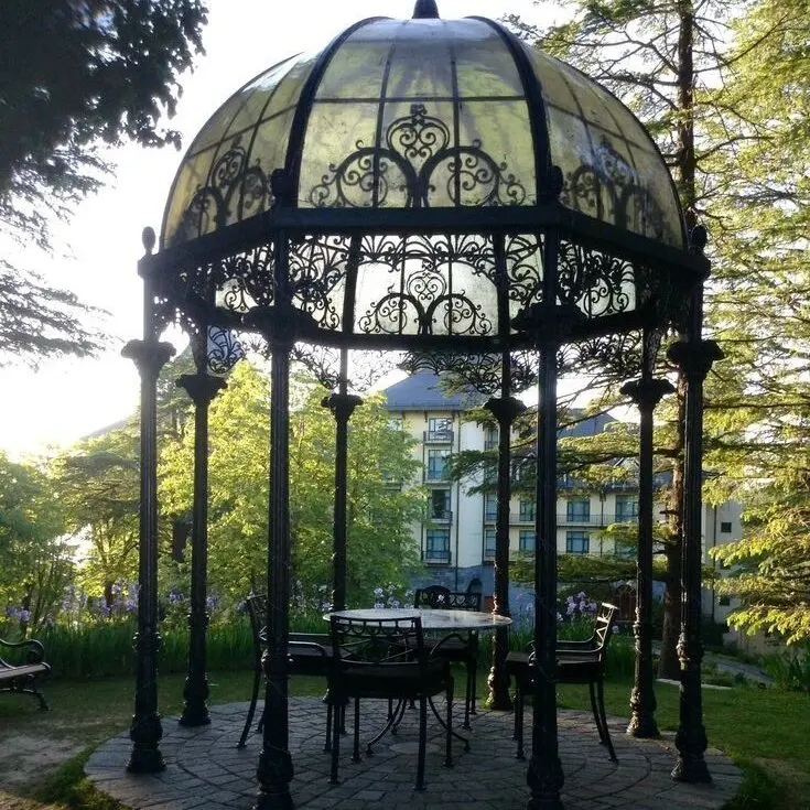 Elegant Garden Gazebo With Wrought Iron Structure And Polycarbonate Roof
Elegant Garden Gazebo With Wrought Iron Structure And Polycarbonate Roof